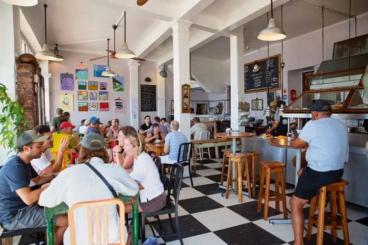 The Olympia Cafe was once a fish bait shop and is now a bustling eatery. (Image courtesy of Olympia Cafe and Bakery).
