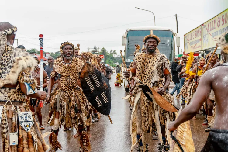 Ngoni men in procession in the streets of Chipata leading up to the big day. (Image by Lint Studios for Nkwazi Magazine).