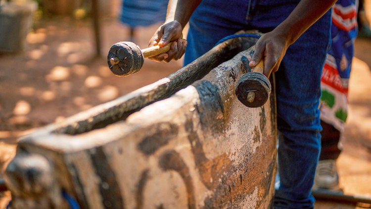 Royal drums crack open the morning—deep, repetitive pulses that marshal the procession, cue dancers, and signal each pivot in the programme. (Image by Chona Mweemba for Nkwazi Magazine).