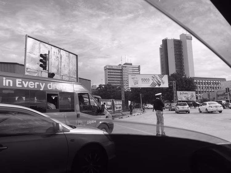 Heavy traffic attracts officers, their eyes hunting for vehicles in the wrong. (Image by Eddie Musabula).