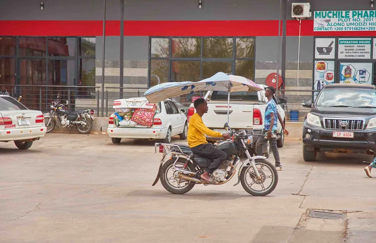 A bike taxi is a common mode of transportation in Chipata, shuttling passengers around quickly. Photo: Nkwazi Magazine/Chosa Mweemba.