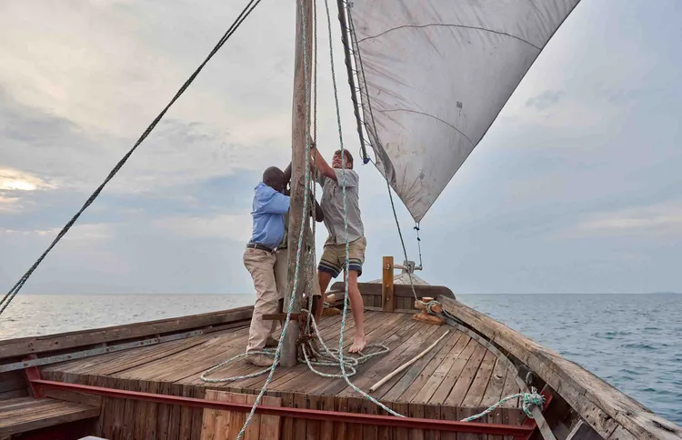 Hoisting sail as the wind picks up over the lake. Photo: Nkwazi Magazine/Chosa Mweemba.