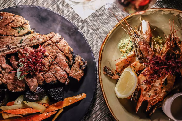 Dishes where ocean freshness meets the earthy warmth of African hospitality. (Image courtesy of The Four Seasons Hotel).