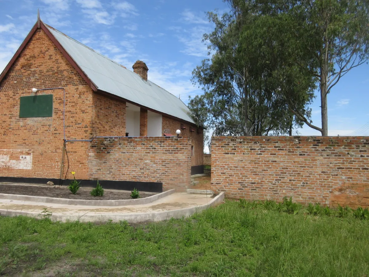 The old prison, built in 1912, boasts simple symmetry, its stone and mortar radiating history and endurance. (Image by Pat The Great courtesy of Atlas Obscura).
