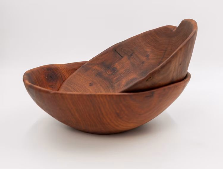 No two bowls are ever the same, as each item is lovingly hand-carved from different sources of timber, and the hands that carve them have a different temperament each day. (Image by Justine Kunda for Nkwazi Magazine).