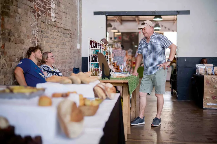 Visitor engaging with vendors. Photo: Victoria Yards.