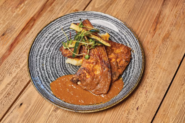 Cargo88 is behind the polished storefronts of East Park Mall, the container-clad exterior gives an industrial feel, unapologetically different. (Image by Dickson Kunyongana for Nkwazi Magazine).