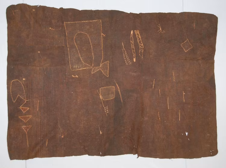 Pieces of the barkcloth are taken & sewn together with a thread made from the